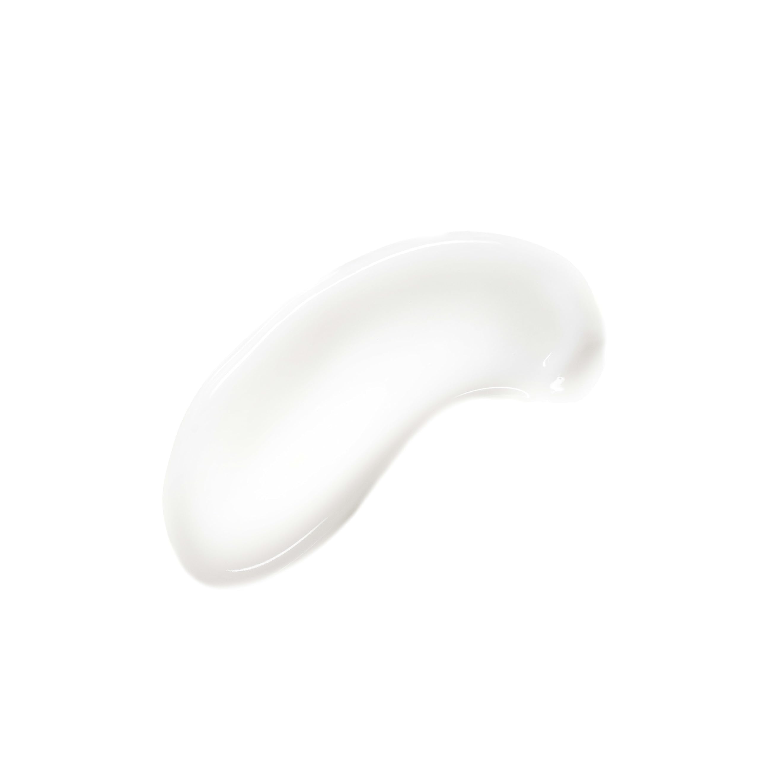 Applying micellar milk with a cotton pad to eye area for gentle makeup removal