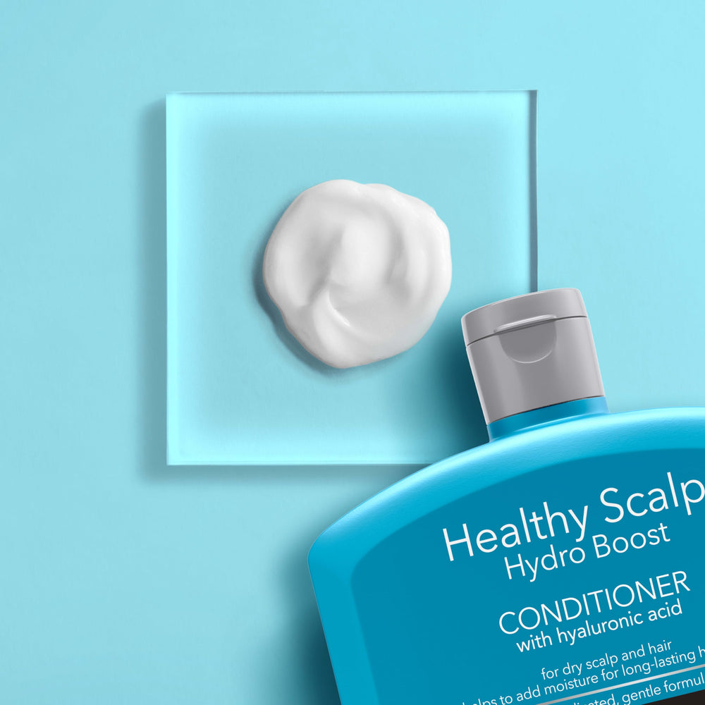 Neutrogena Scalp HB before and after on curly hair showing improved softness benefit