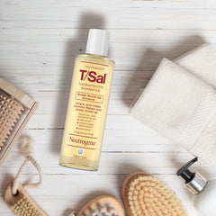 Neutrogena T/Sal bottle staged on bathroom shelf for daily routine