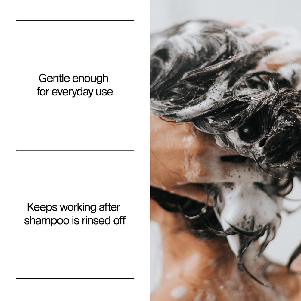 Neutrogena T/Sal in use under shower illustrating easy application routine