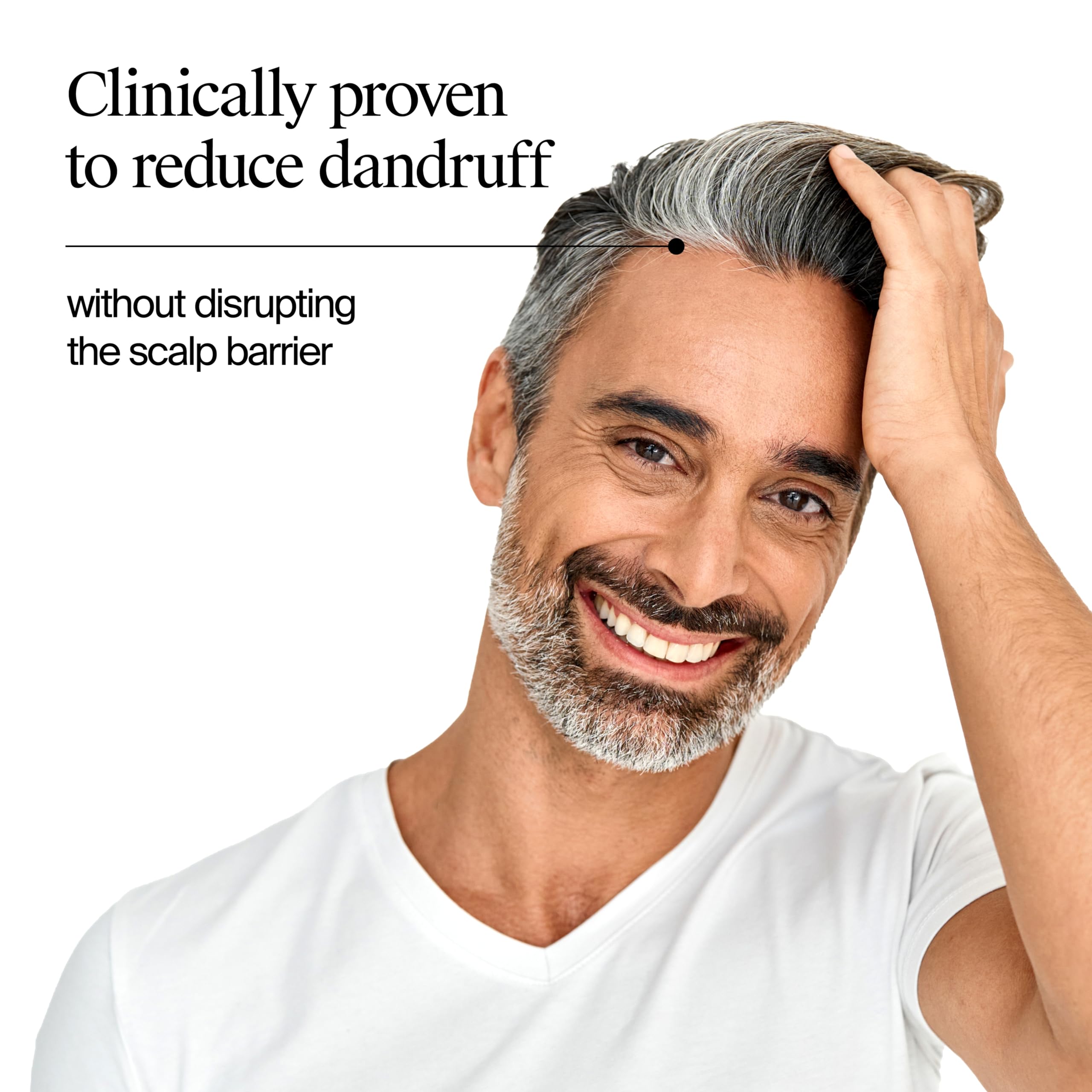 Neutrogena T/Sal+ shampoo being poured and lathered for effective exfoliation