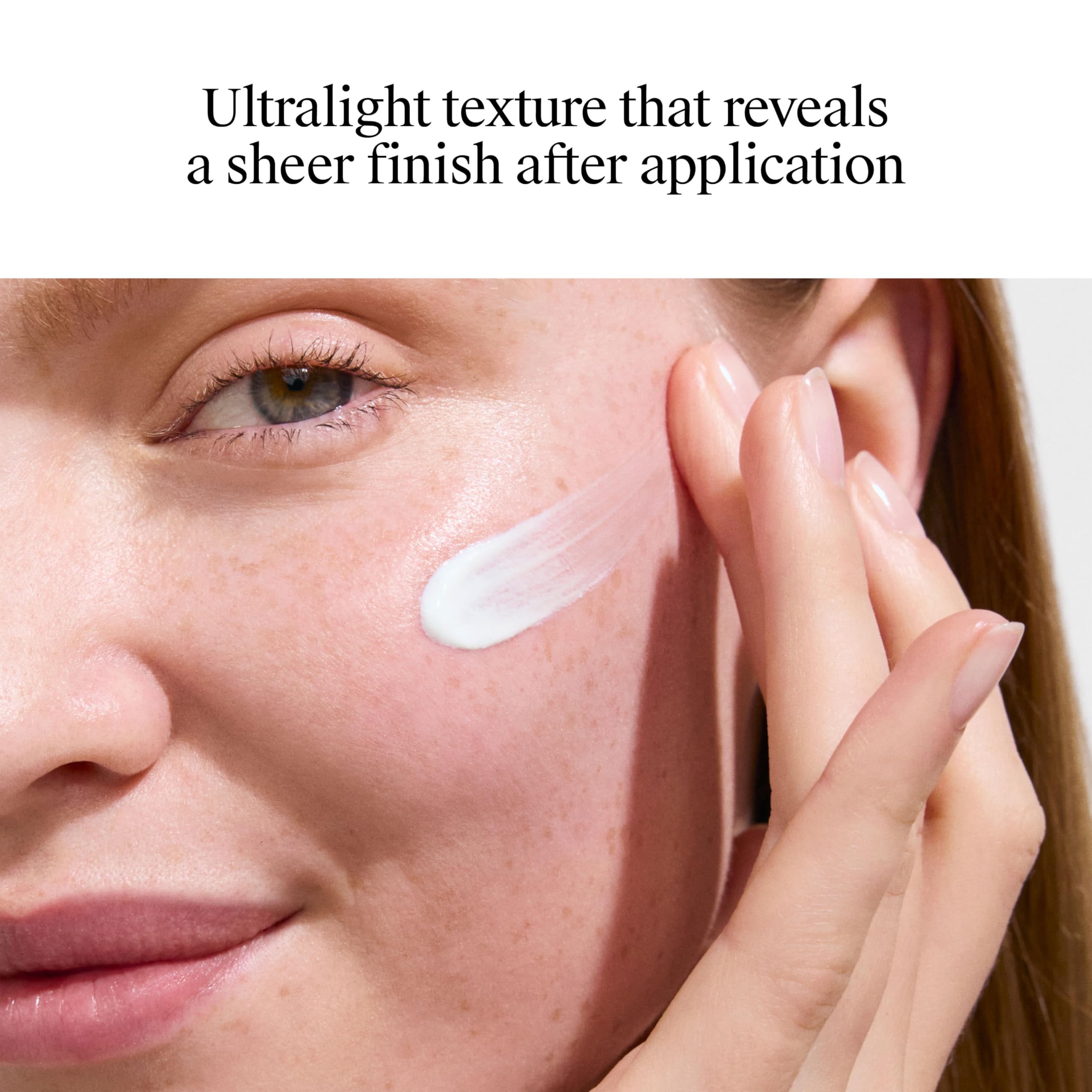 Neutrogena 1.4 fl oz tube in hand showing travel-size convenience benefit