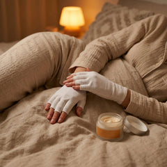 NEVTORAU gloves on a nightstand next to lotion showing practical overnight moisturizing routine