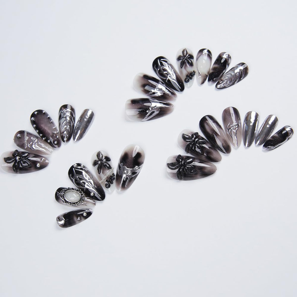 NEWSPIED close-up of 3D metallic rhinestones and flower detail, eye-catching sparkle benefit