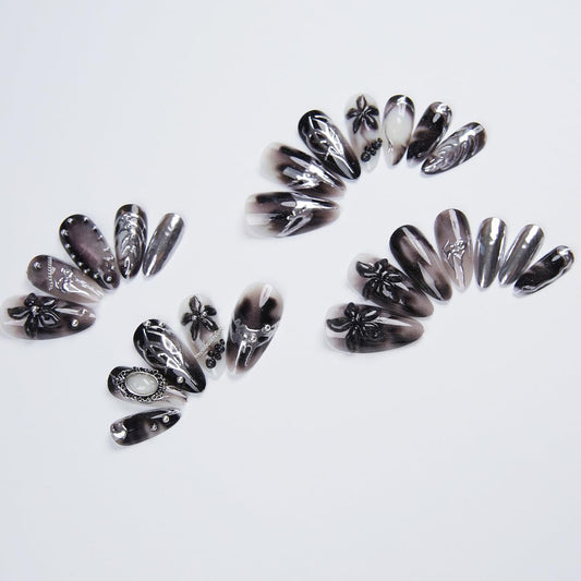 NEWSPIED close-up of 3D metallic rhinestones and flower detail, eye-catching sparkle benefit
