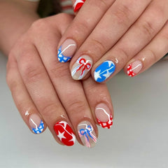 NEWSPIED front packaging showing 24-piece patriotic press-on nails for quick styling