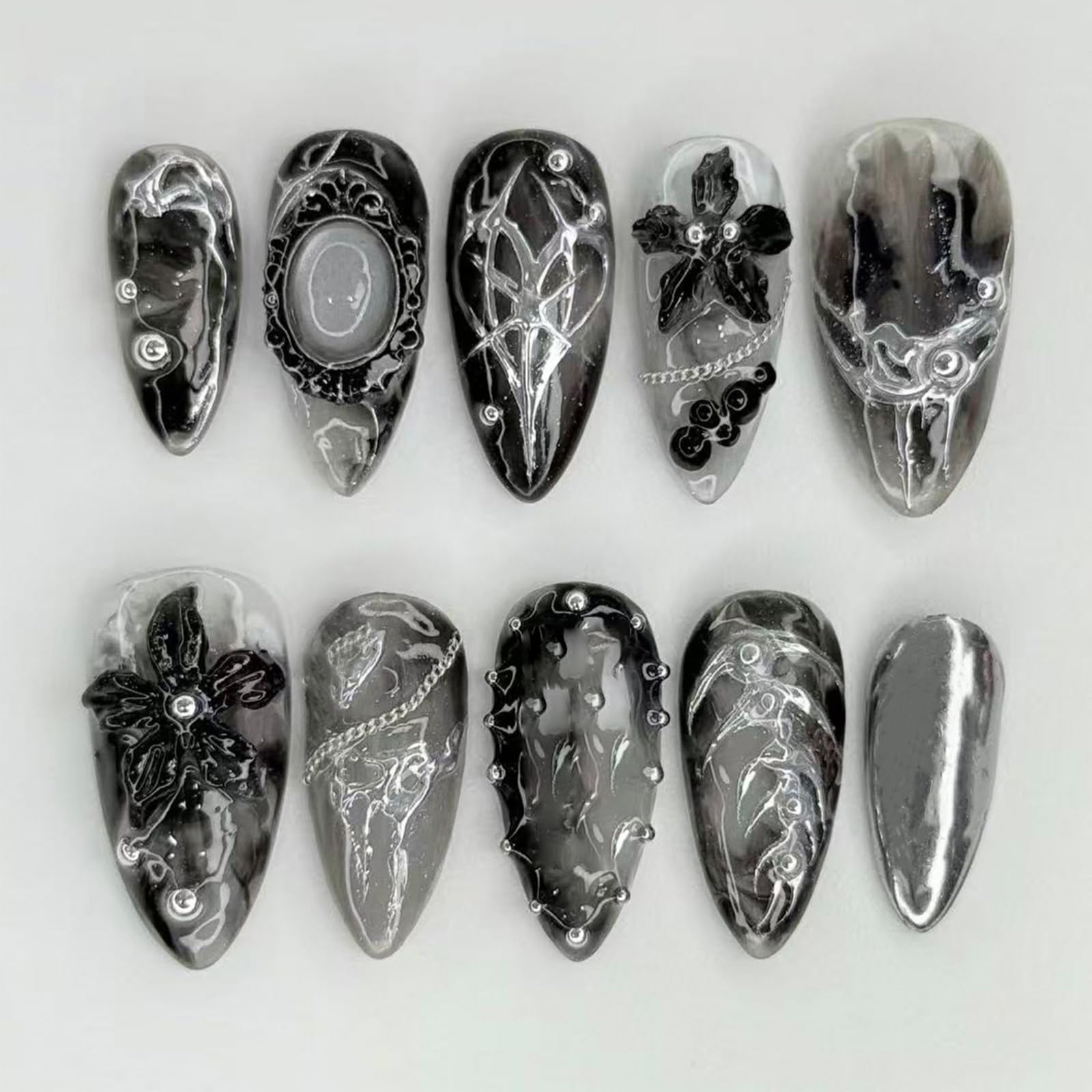 NEWSPIED front packaging showing 24-piece gothic press-on nails, ready-to-wear benefit