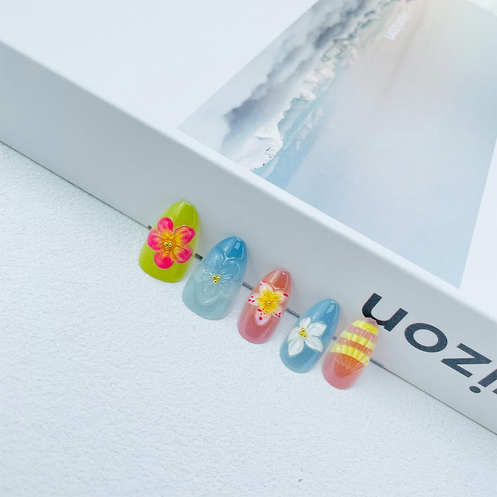 NEWSPIED nails applied on hand at a summer event, demonstrates wearable style
