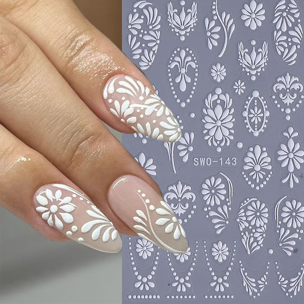 NEWSPIED stickers adhered to acrylic tips showing professional finish