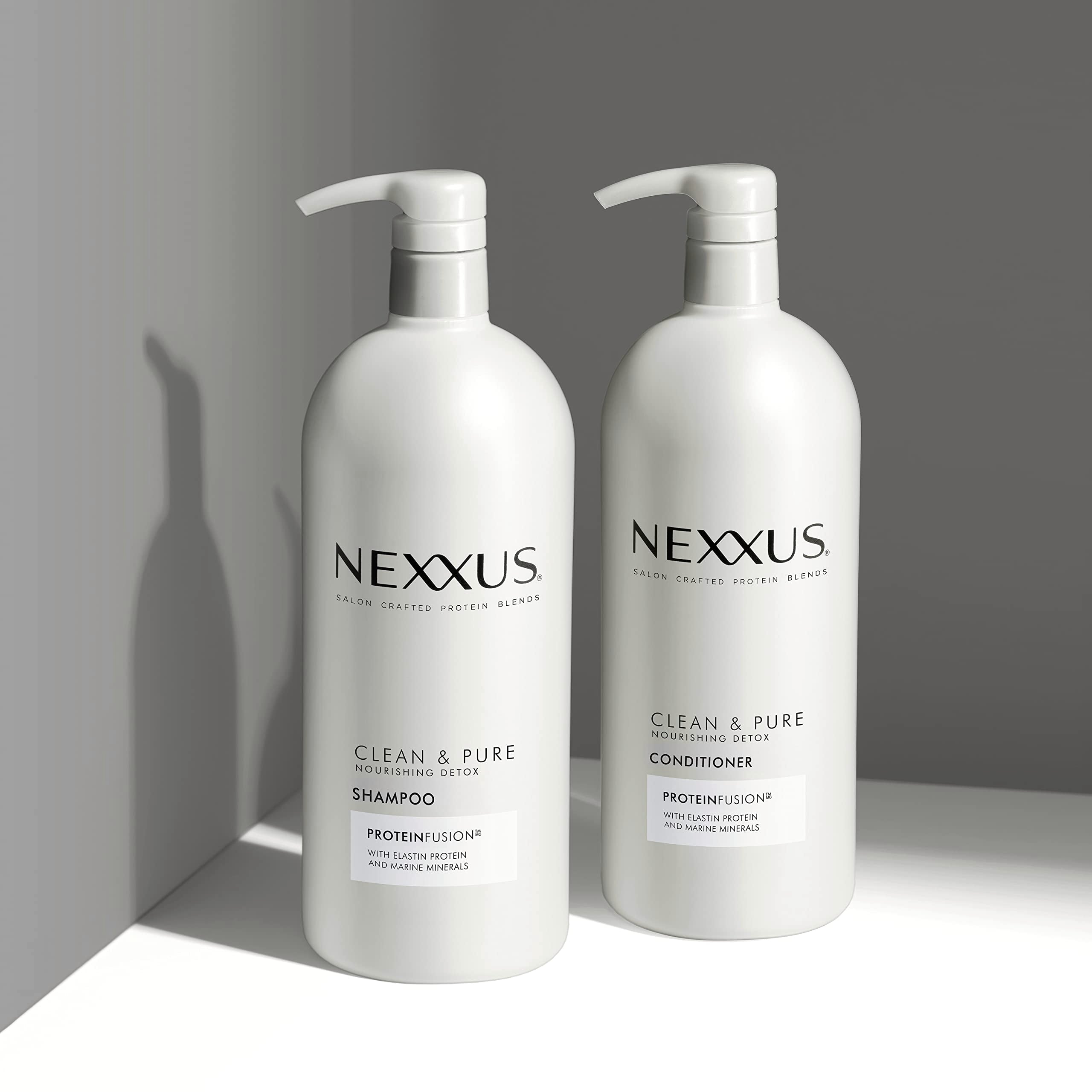 Nexxus 33.8 oz bottle beside common items to show true size benefit