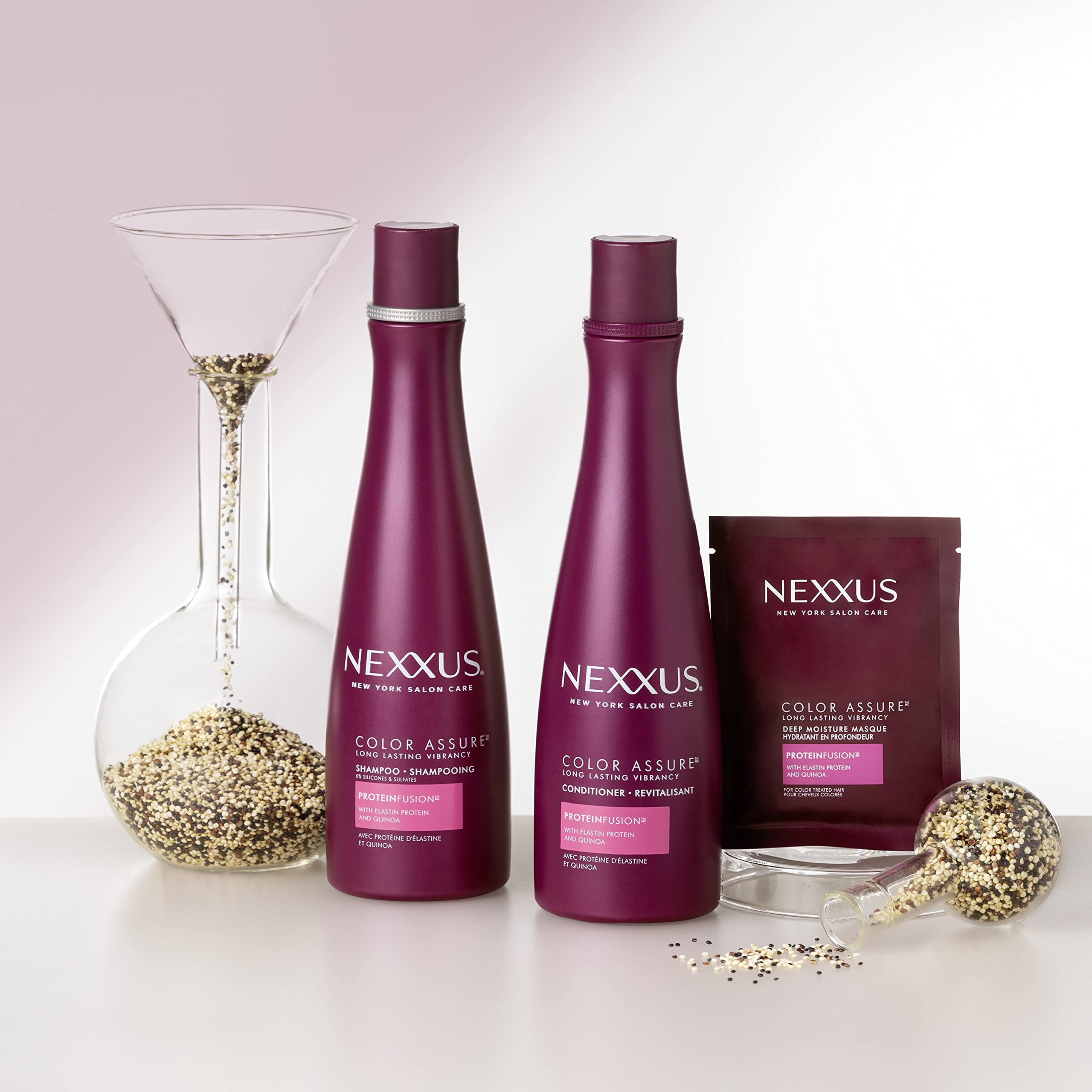 Nexxus duo bottles in hand showing true size and travel-friendly scale