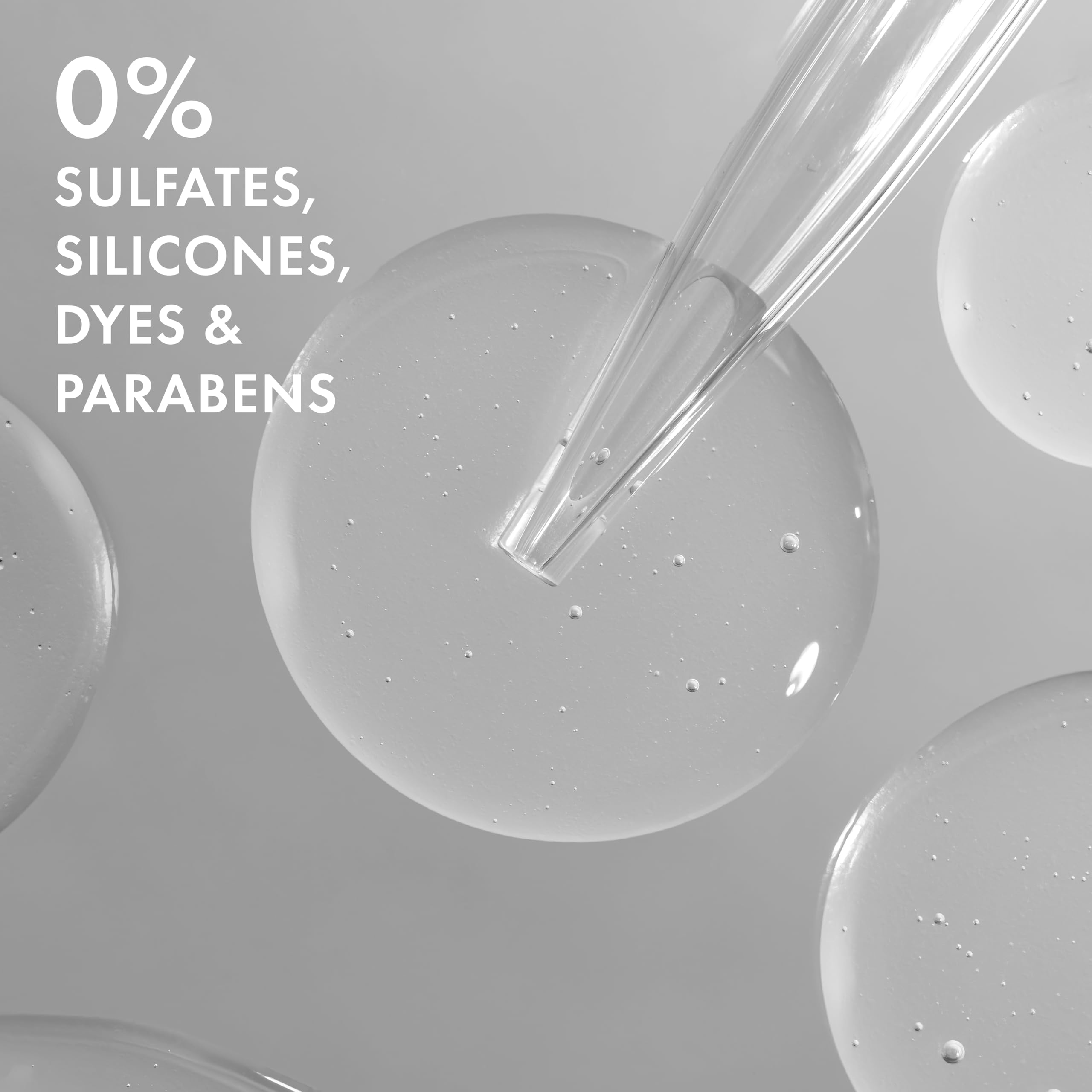 Nexxus conditioner in shower applied to hair demonstrating buildup removal benefit