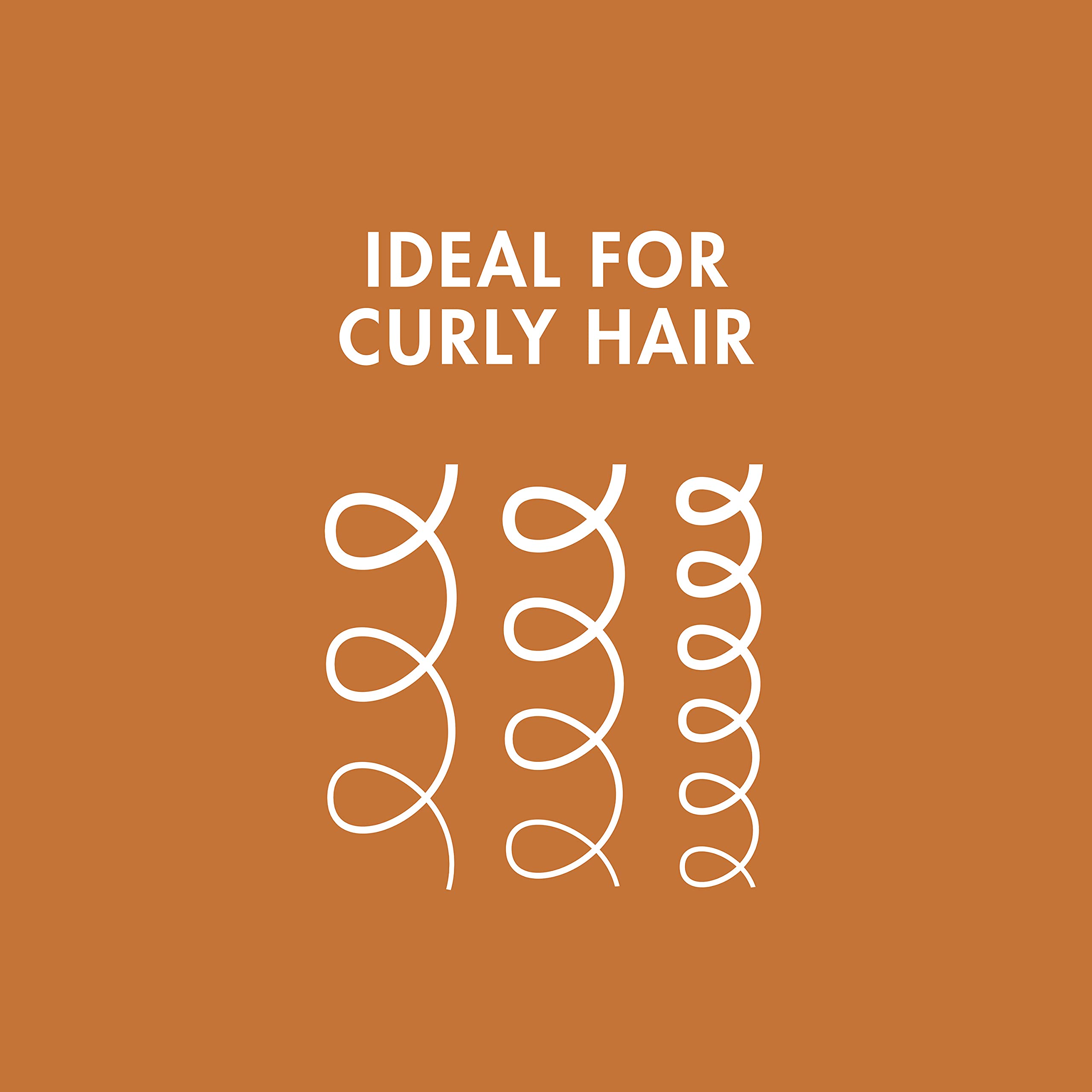 Nexxus being applied to curly hair demonstrating easier styling