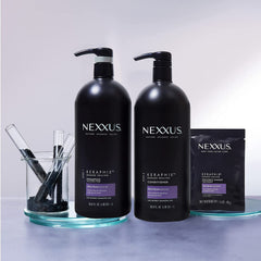 Nexxus Keraphix on bathroom vanity in lifestyle scene suggesting a salon treatment at home