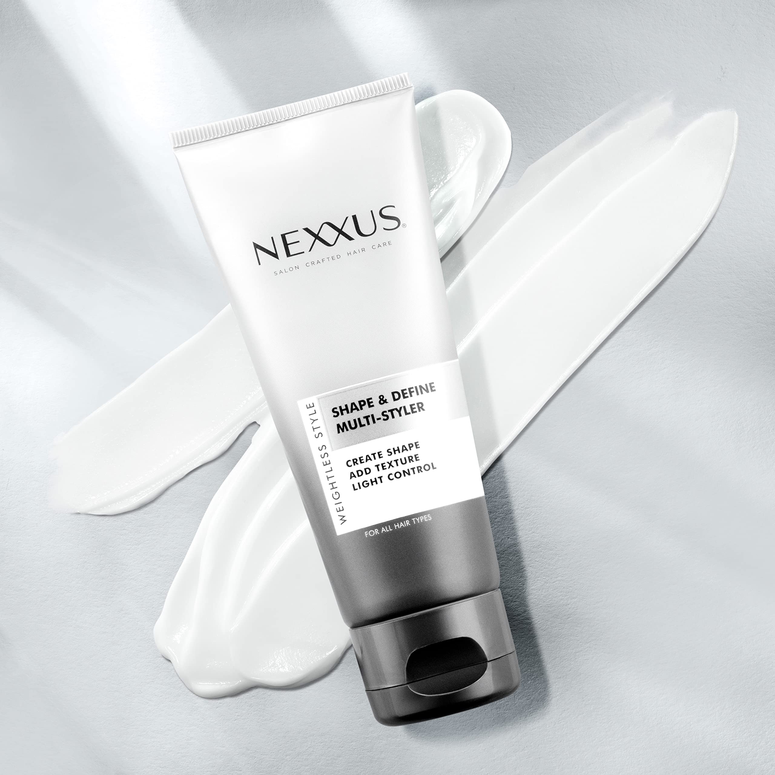 Nexxus cream texture close-up showing smooth weightless formula benefit