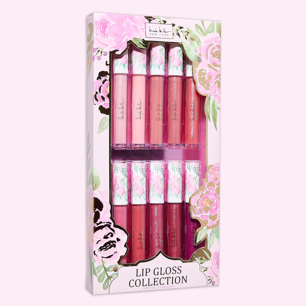 Nicole Miller gloss held in hand showing compact size and travel convenience