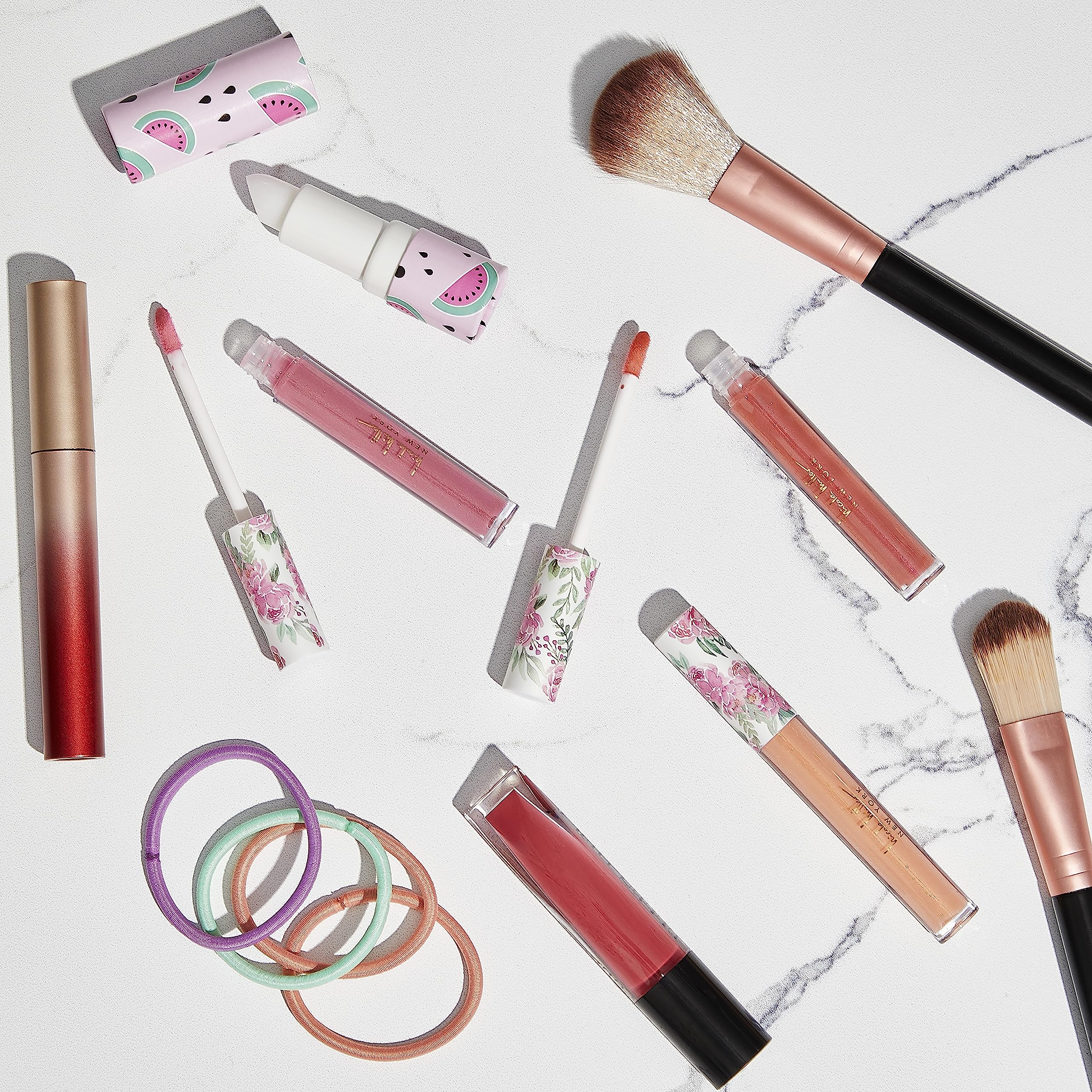 Nicole Miller application on lips in lifestyle scene showing radiant shine and stylish look