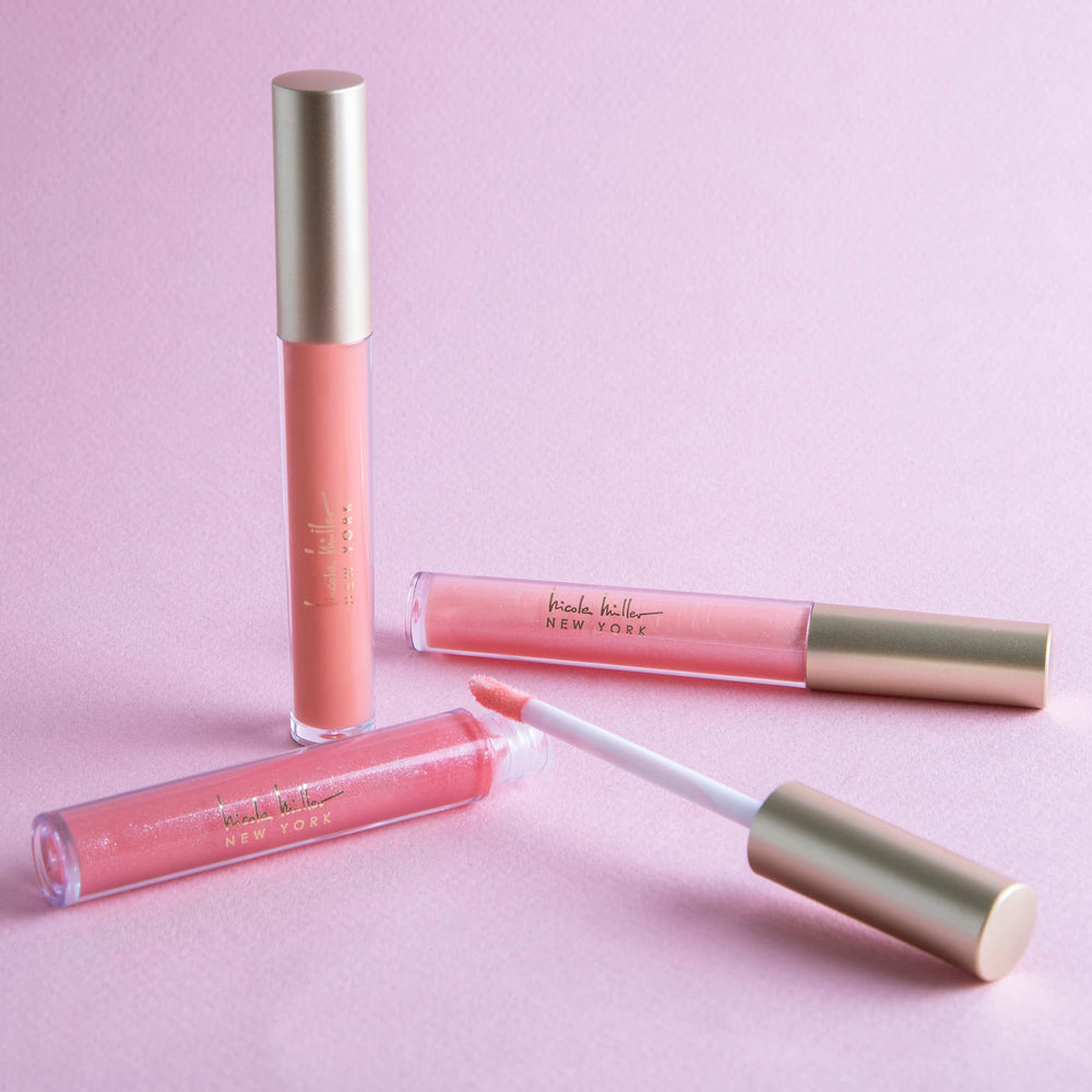 Nicole Miller open applicator close-up highlighting smooth glossy finish and easy application