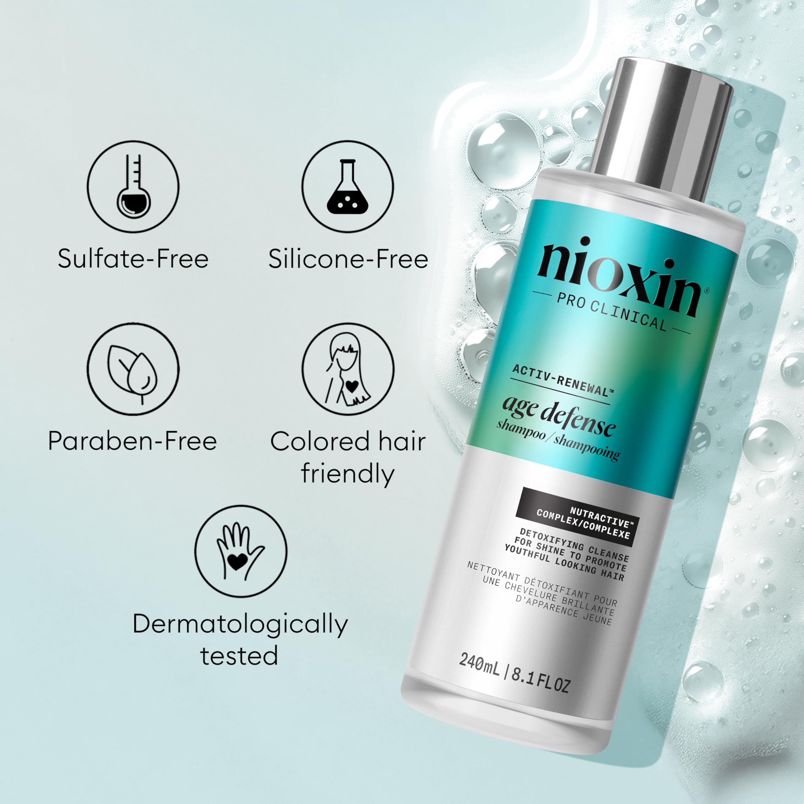 NIOXIN bottle in hand to show 50mL travel-friendly size and convenience