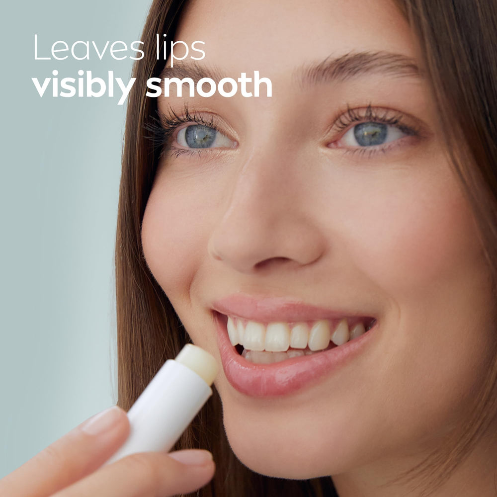 NIVEA lip balm on a vanity with flowers, everyday skincare routine benefit