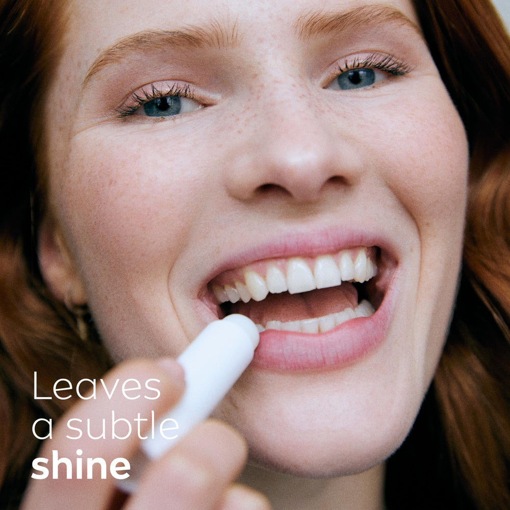 NIVEA lip balm application on lips illustrating immediate soothing benefit