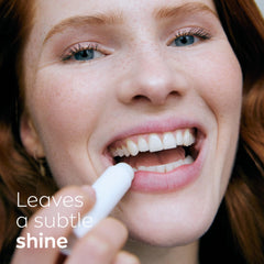NIVEA lip balm application on lips illustrating immediate soothing benefit