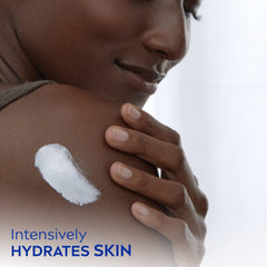 NIVEA open tin revealing cream texture for quick absorption benefit