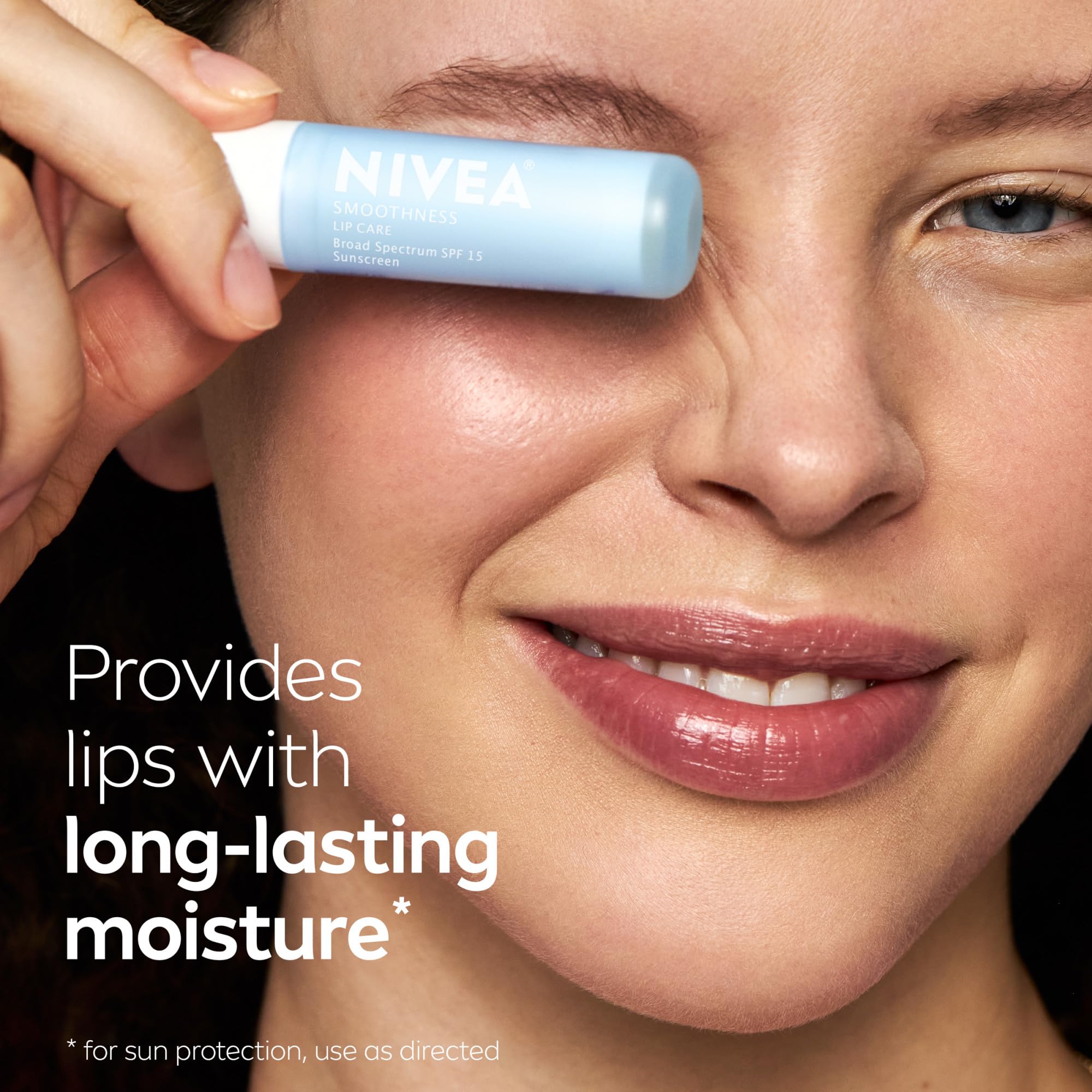 NIVEA model applying smoothness lip balm demonstrating hydration and protection
