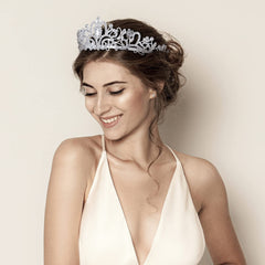 Nljihkure tiara worn in bridal hairstyle demonstrating polished look and photogenic finish