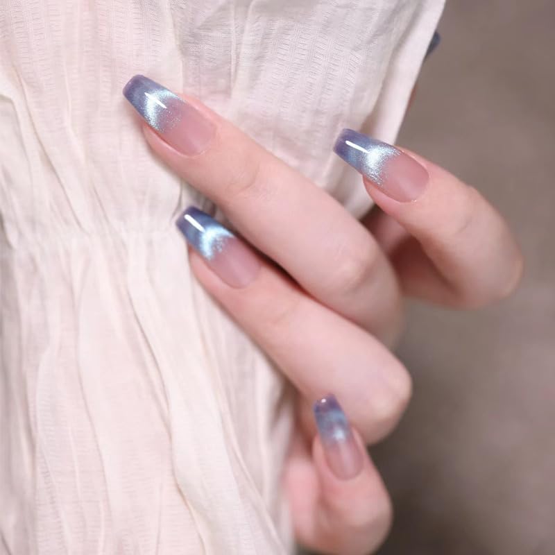 NNIPRAIYE nail application in progress placing adhesive tab, benefit: quick home use