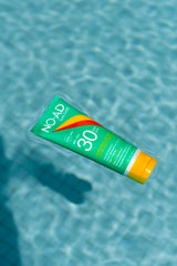 NO-AD lotion being applied to skin offering lightweight coverage
