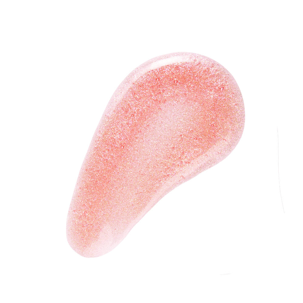 No7 Pink Slip texture swatch on skin highlighting glossy finish and hydrating jojoba benefit