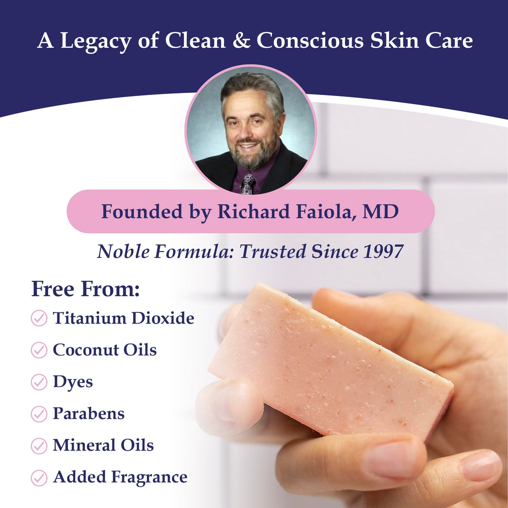 Hand holding Noble Formula soap bar to show real size and easy travel convenience