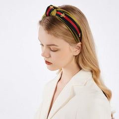 NODG headband size comparison held in hand illustrating 2.5-inch width