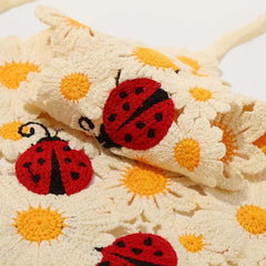 NOIAFZY zoom on ladybug motif highlighting playful accent to outfits