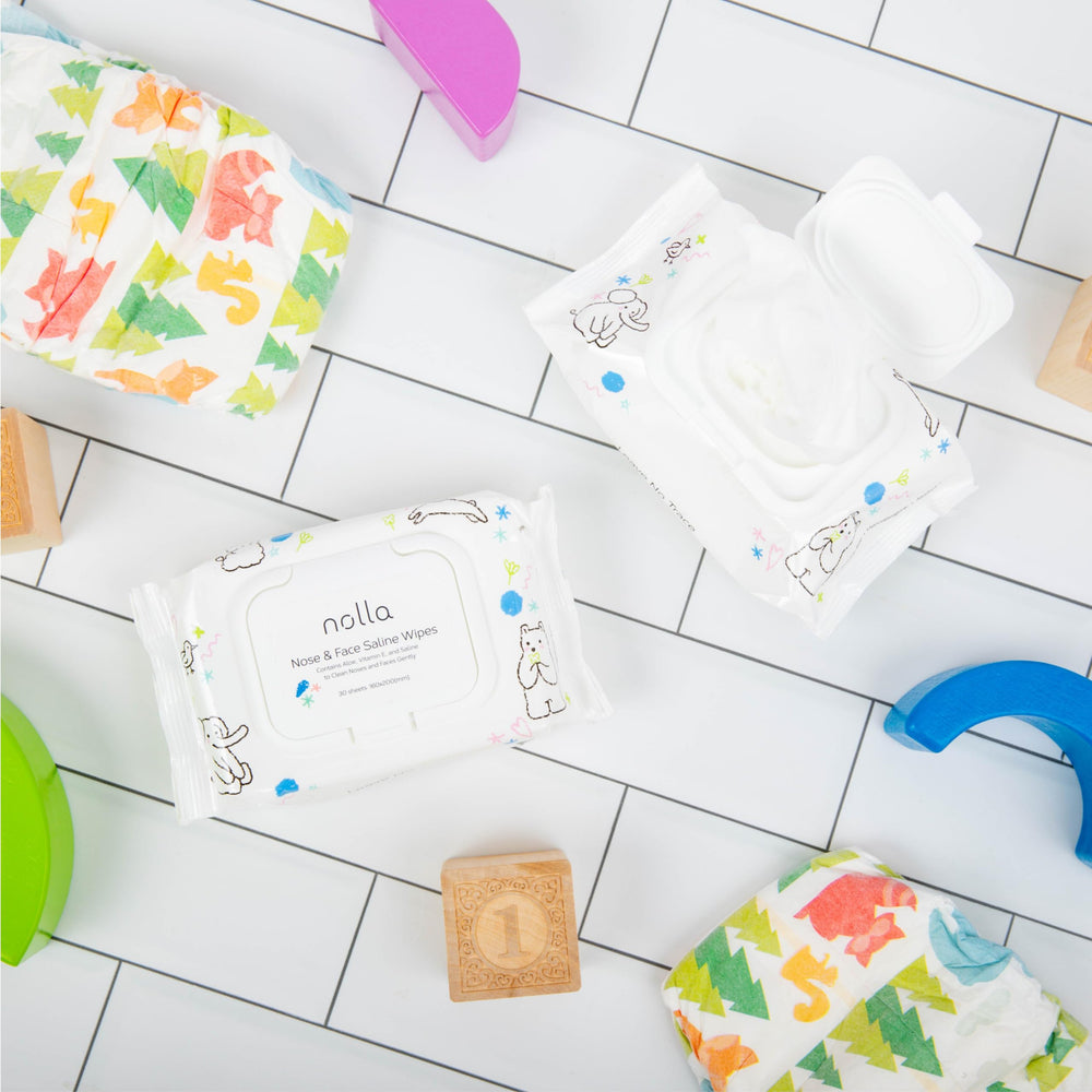 Lifestyle nursery scene with Nolla wipes ready for everyday messes