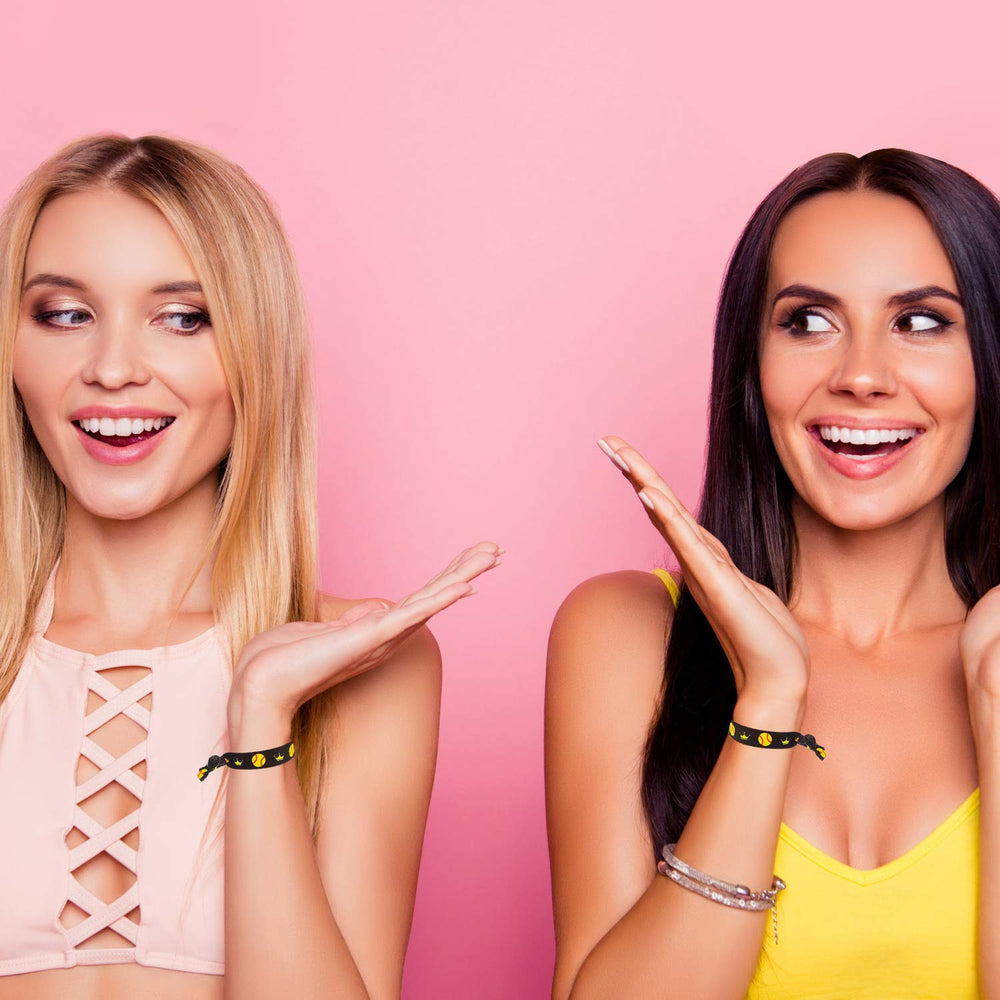 Norme hair ties next to ruler showing 4-inch diameter for clear size comparison