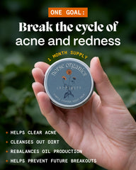 Norse Organics fingertip applying balm demonstrating precise spot treatment