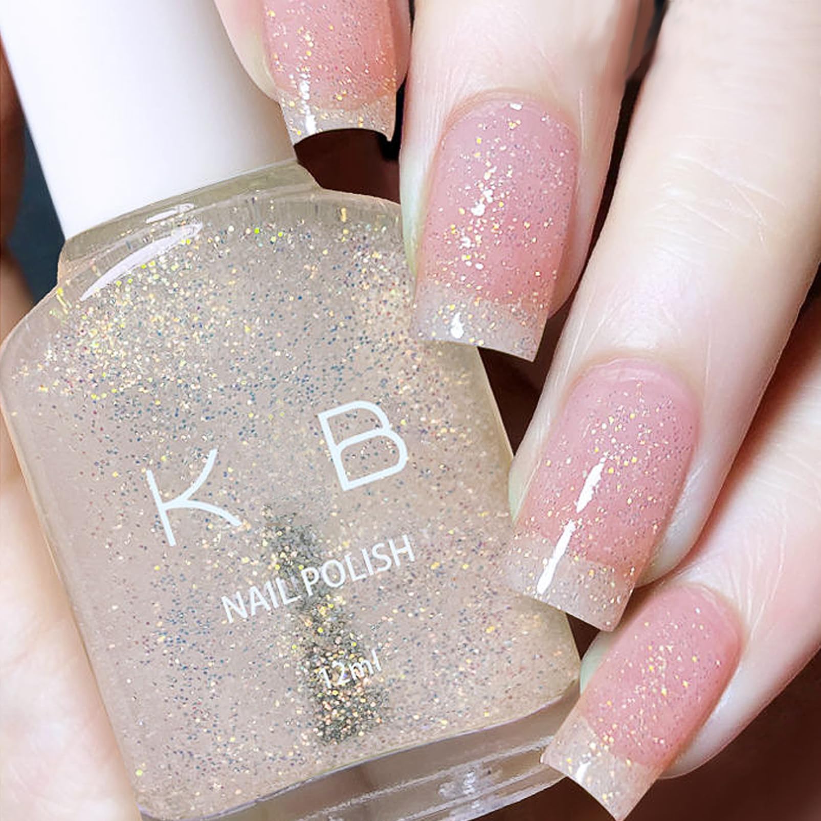 NovaCharm bottle front showing label and clear glitter for elegant shine
