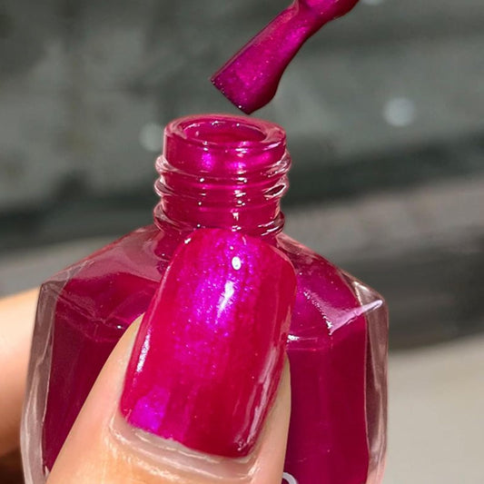 NovaCharm bottle front packaging showing hot pink color and label benefit