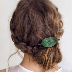 Noverlife barrette securing a low bun hairstyle demonstrating quick, secure styling
