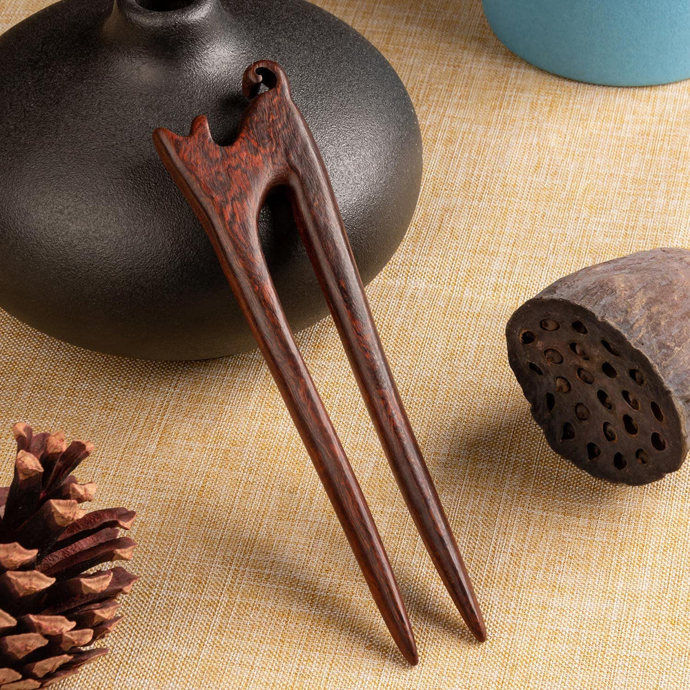Noverlife hair sticks holding a chignon bun to demonstrate secure everyday updo