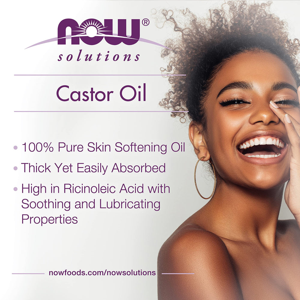 Person applying NOW Foods castor oil to hands demonstrating softening benefit