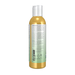 NOW Foods jojoba oil label detail highlighting USDA Organic and Non-GMO benefits