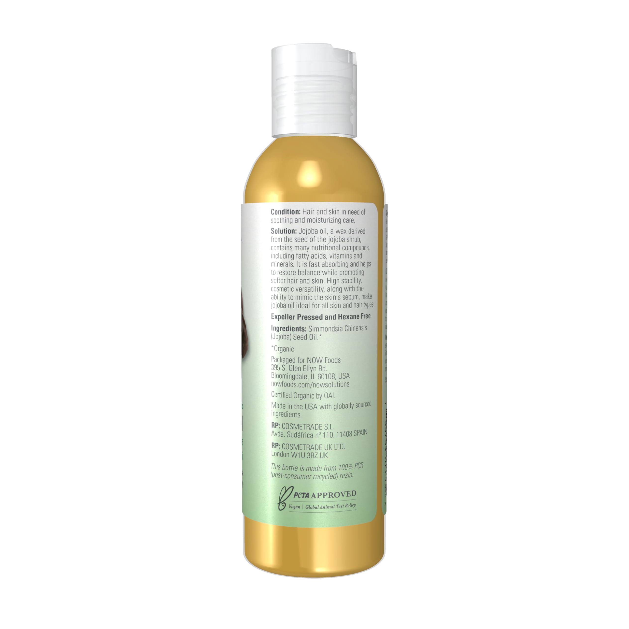 NOW Foods jojoba oil pouring closeup demonstrating silky texture and absorbency