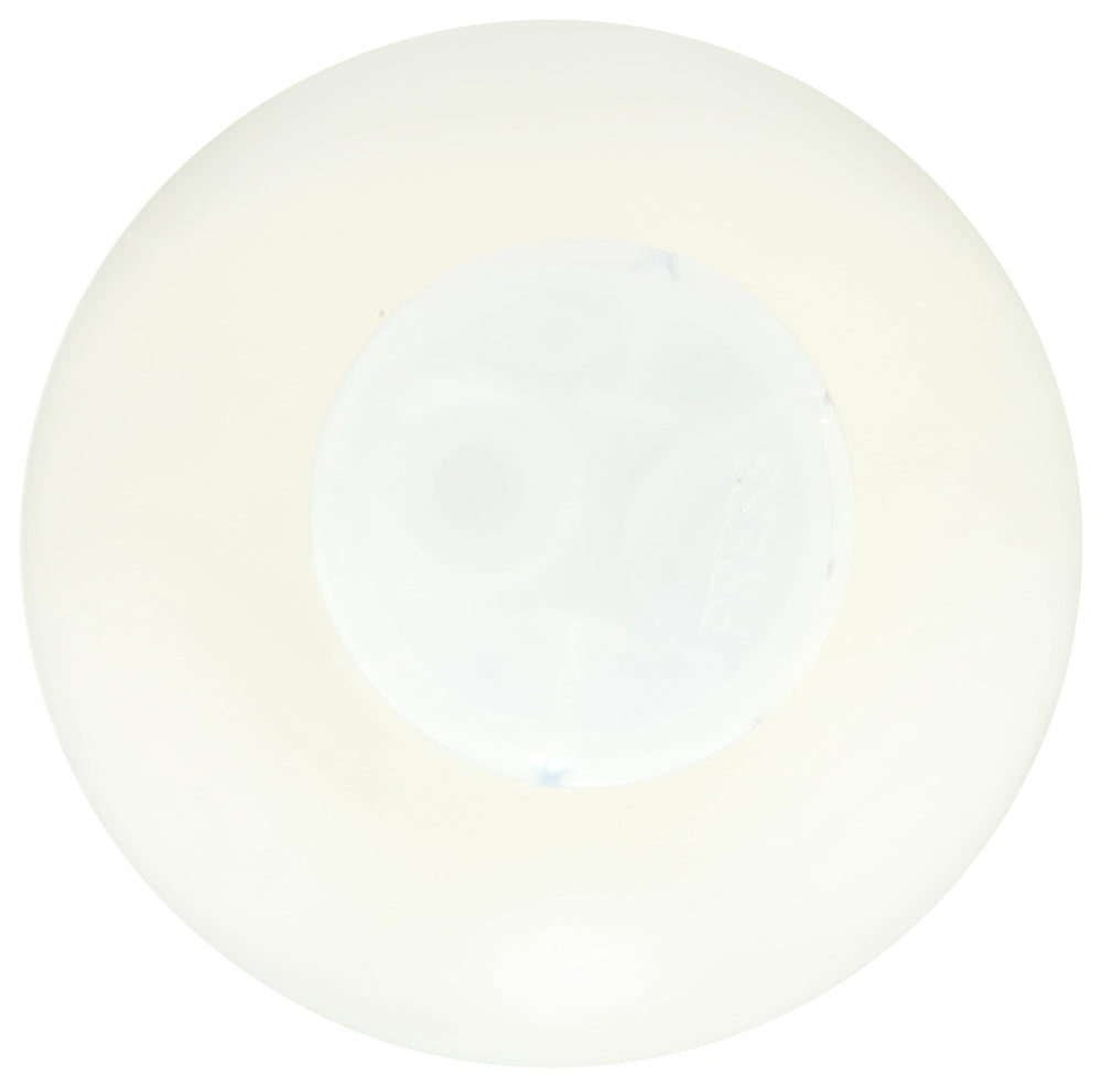 Close-up of Nubian Heritage lotion texture on skin, highlights creamy non-greasy finish and softness