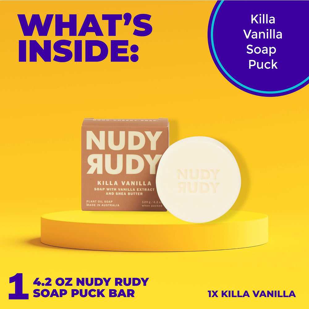 Nudy Rudy soap bar in hand showing 4.2 oz travel-friendly size