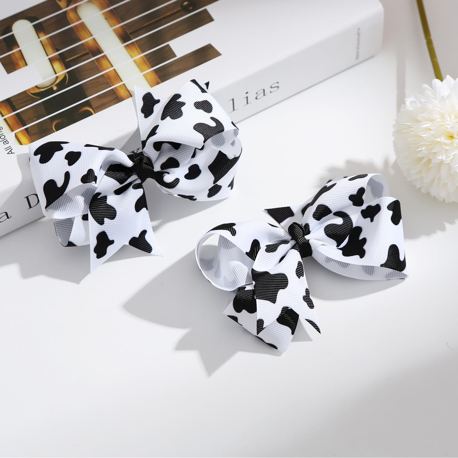 Nuolich toddler wearing bow in ponytail for playful styling benefit