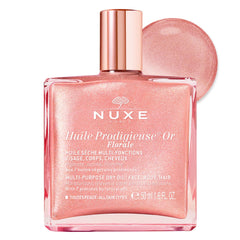 NUXE front bottle showing elegant rose-gold glow and portable size benefit
