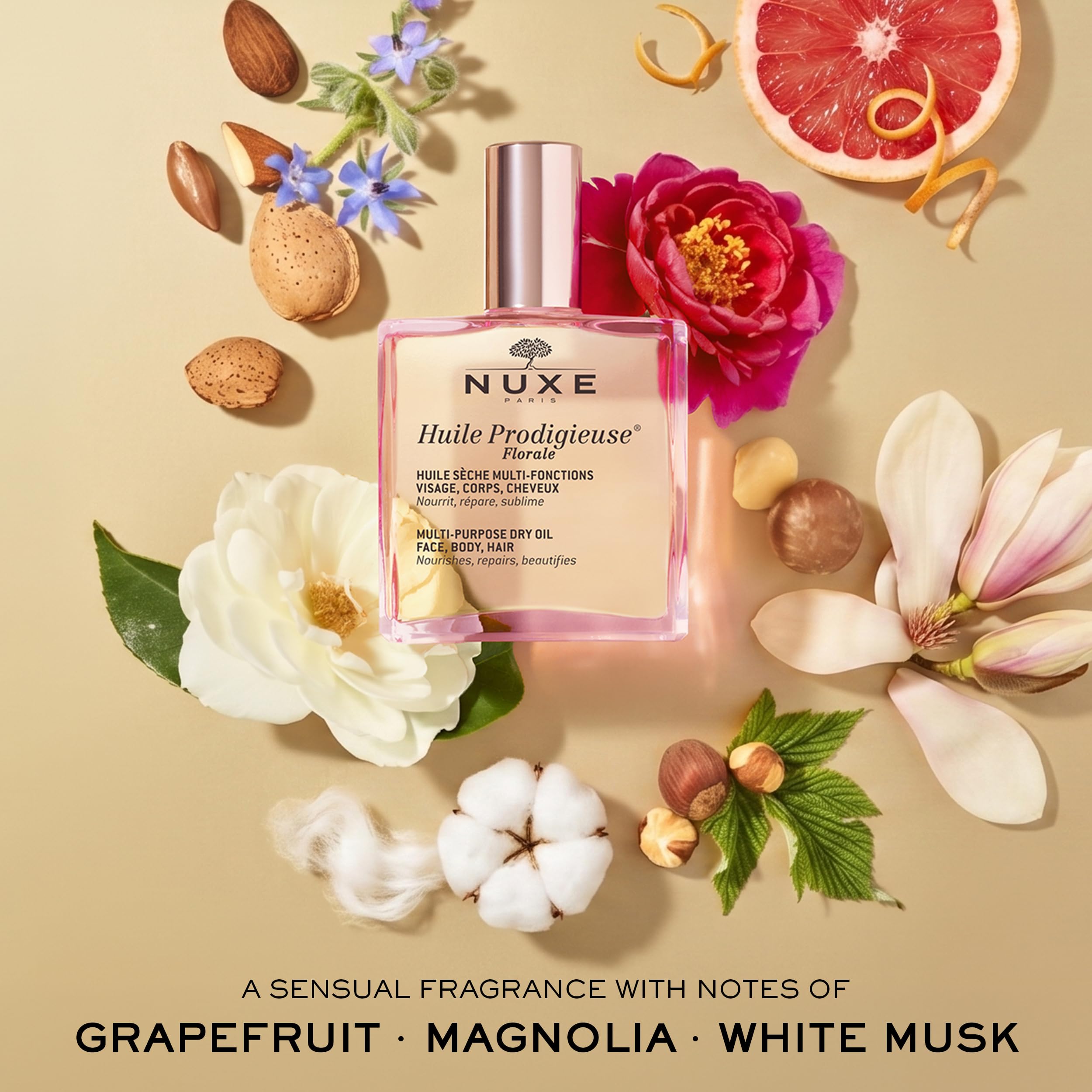 NUXE oil beside common items to show 3.3 fl oz size and portability benefit